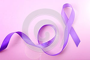 International Womens Day Purple Ribbon Symbol woth lens flare