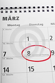Internationaler Frauentag or international women's day on March 8 circled in german calendar