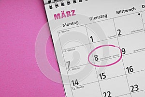 Internationaler Frauentag or international women's day on March 8 is circled in german calendar