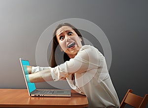 Internet absorbing shocked woman