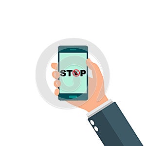 Internet addiction, nomophobia and digital detox. Hand holding smartphone. Stop sign on screen telephone mobile