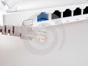 internet cable close-up on the background of a Wi-Fi router, close-up, cable and wireless internet, lan cable, Gigabit