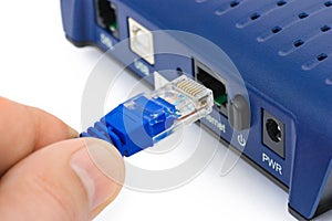 Internet cable in hand and modem