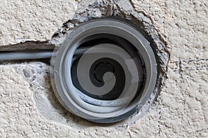 Internet cable inside a wall socket