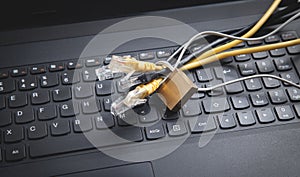 Internet cables with a padlock on the laptop