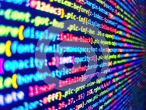 Internet concept, javascript code. Data encryption security code on a computer display, close up. Writing program code on computer