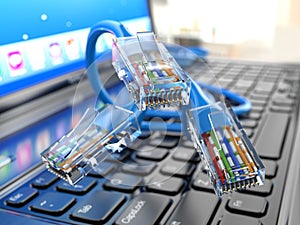 Internet concept. Laptop and ethernet cables.