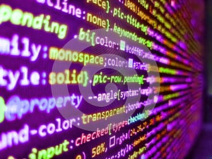 Internet connection stream flow concept. Code language on a computer screen with a shallow depth of field. Abstract computer