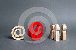 An internet email symbol and a group of people are separated by a red prohibitory symbol No. restrictions on access to the global