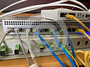 internet network devices connected to each other via cable. proxy, hub, and router