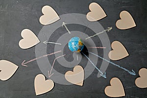 Internet or online dating and love. Global communication, networking and sharing concept. Globe and figures of hearts