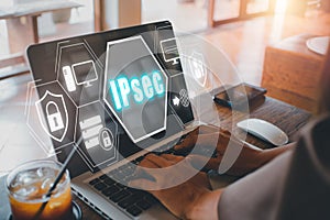 Internet and Protection Network Vector concept, Person using laptop computer on desk with  IPsec icon on virtual screen