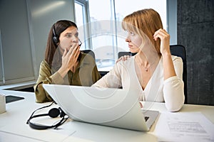 Internet saleswomen working with clients