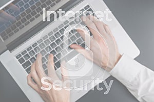 Internet security computer data symbol on blured keyboard background. Hacker attack and data breach, information leak