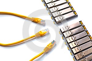Internet SFP Small Form-factor Pluggable network modules and yellow patch-cords with RJ45 for Lan network .