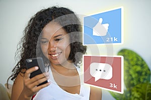 Internet social media app likes and chat comments icons composite on young beautiful and happy mixed ethnicity hispanic woman at