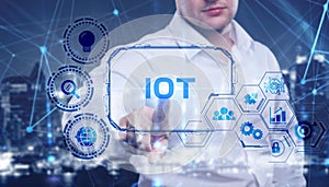 Internet of things - IOT concept. Businessman offer IOT products and solutions. Young businessman  select the abstract chip with