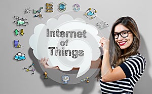 Internet of Things text with woman holding a speech bubble