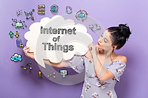 Internet of Things with woman holding a speech bubble