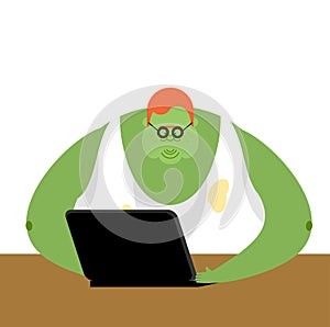 Internet trol. Big green monster and laptop. Vector illustration