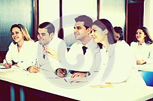 Interns at lecture at university