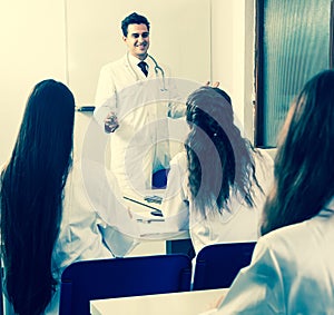 Interns at lecture at university