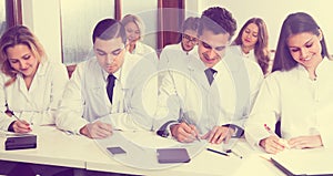 Interns at lecture at university