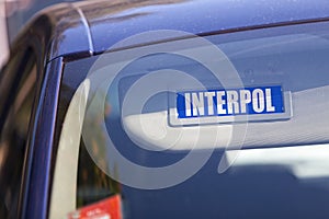 Interpol - Car sun visor sign