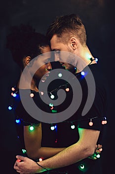 Interracial couple tied, togetherness and tender