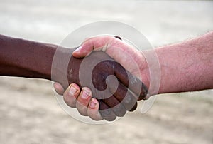 Interracial handshake