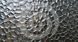 Intersecting gray lines form a geometric pattern on a transparent checkered