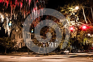 Intersection of Drayton and Gaston Streets at night in Savannah, Georgia.