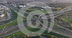 Intersection highway junction crossroad overview top down aerial. Infrastructure road and motor way driving busy street