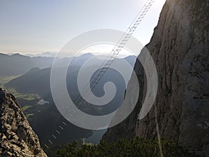 Intersport Klettersteig. One of the most famous via ferratas in the world. The via ferrata on Donnerkogel in Austria. A ladder to