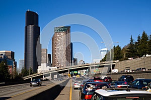 Interstate 5 Highway Cuts Downtown Seattle Skyline During Rush