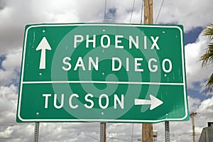 A interstate highway sign in Arizona directing traffic to Tucson, San Diego and Phoenix, AZ