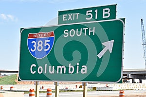 An interstate highway sign on temporay supports