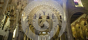 Intertwined, multi-lobed arches in Villaviciosa Chapel, looking photo