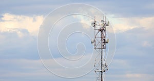 Interval timer shooting. repeater. GSM telephone tower, blue sky background. ADSL, GPRS, LTE.3G. 4G. 5G. RS 1800.CDMA.