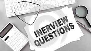 KNOW YOUR ROLE text on a paper with keyboard, calculator on grey background