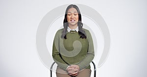 Interview, show and woman in a chair in studio for conversation on TV or online broadcast isolated in white background