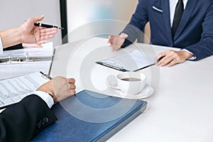 Interviewer or Board reading a resume during a job interview, Em