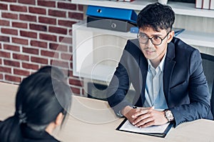 Interviewer interview candidate apply for job at meeting room in office photo