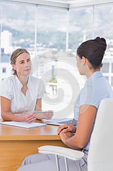 Interviewer and interviewee talking together