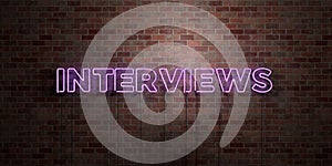 INTERVIEWS - fluorescent Neon tube Sign on brickwork - Front view - 3D rendered royalty free stock picture