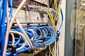 Interweaving of the Internet wires in the server room of the data center.Cabling in the server rack