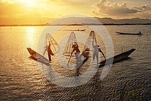 Intha fishermen working in the morning