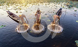 Intha fishermen working in the morning