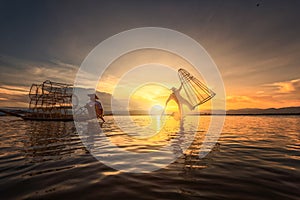 Intha fishermen working in the morning.