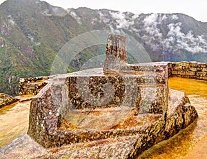 Intihuatana stone as an astronomic clock or calendar by the Incas in Machu Picchu archaeological siteCuzco, Peru